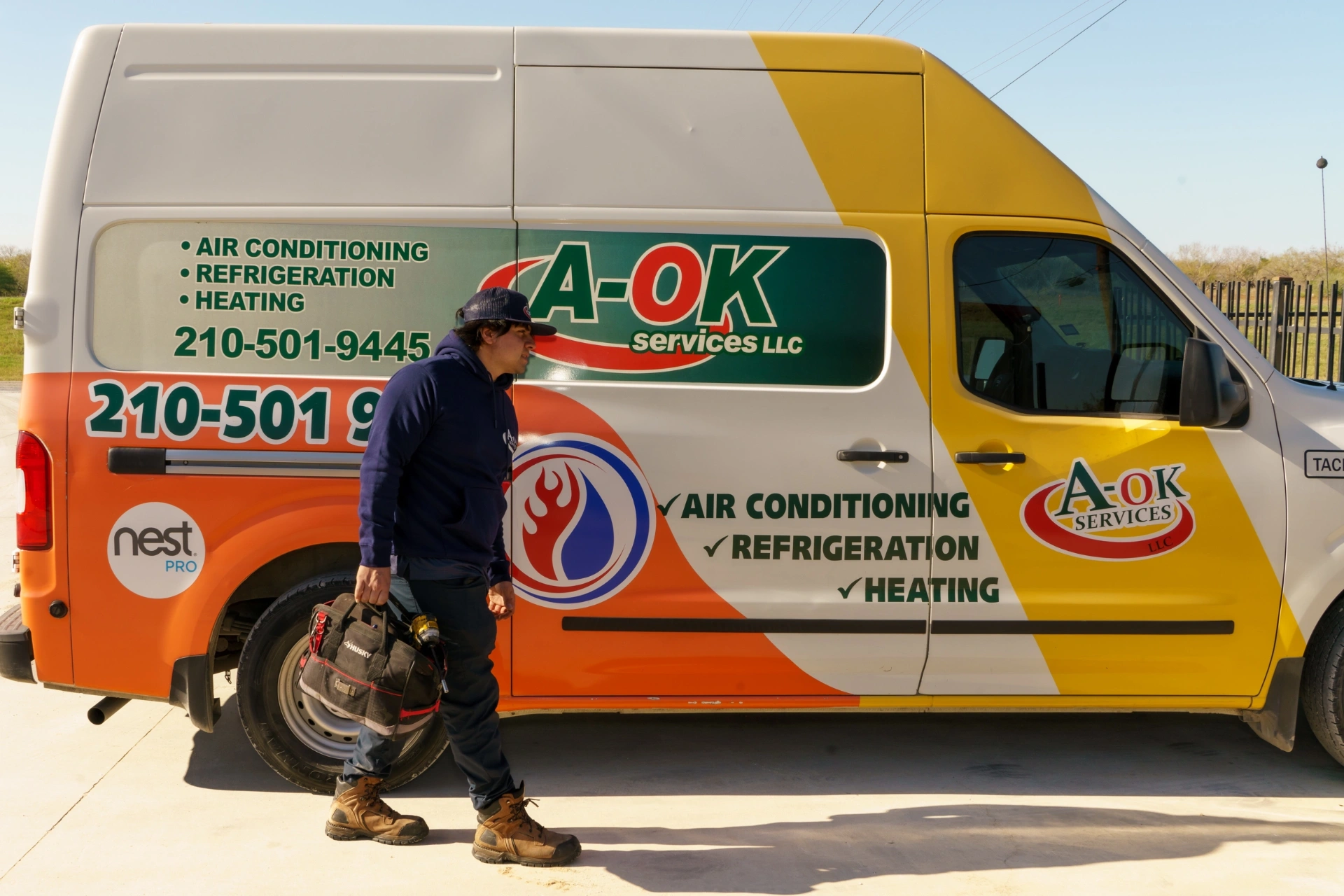A-OK Services licensed TACLA29221C heating contractor van in San Antonio