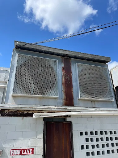 Commercial refrigeration outdoor condenser unit cleaning and maintenance service